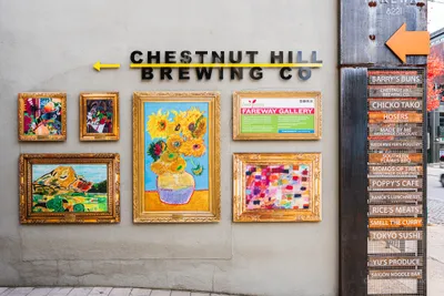 A sign of vendors at the Chestnut Hill Market