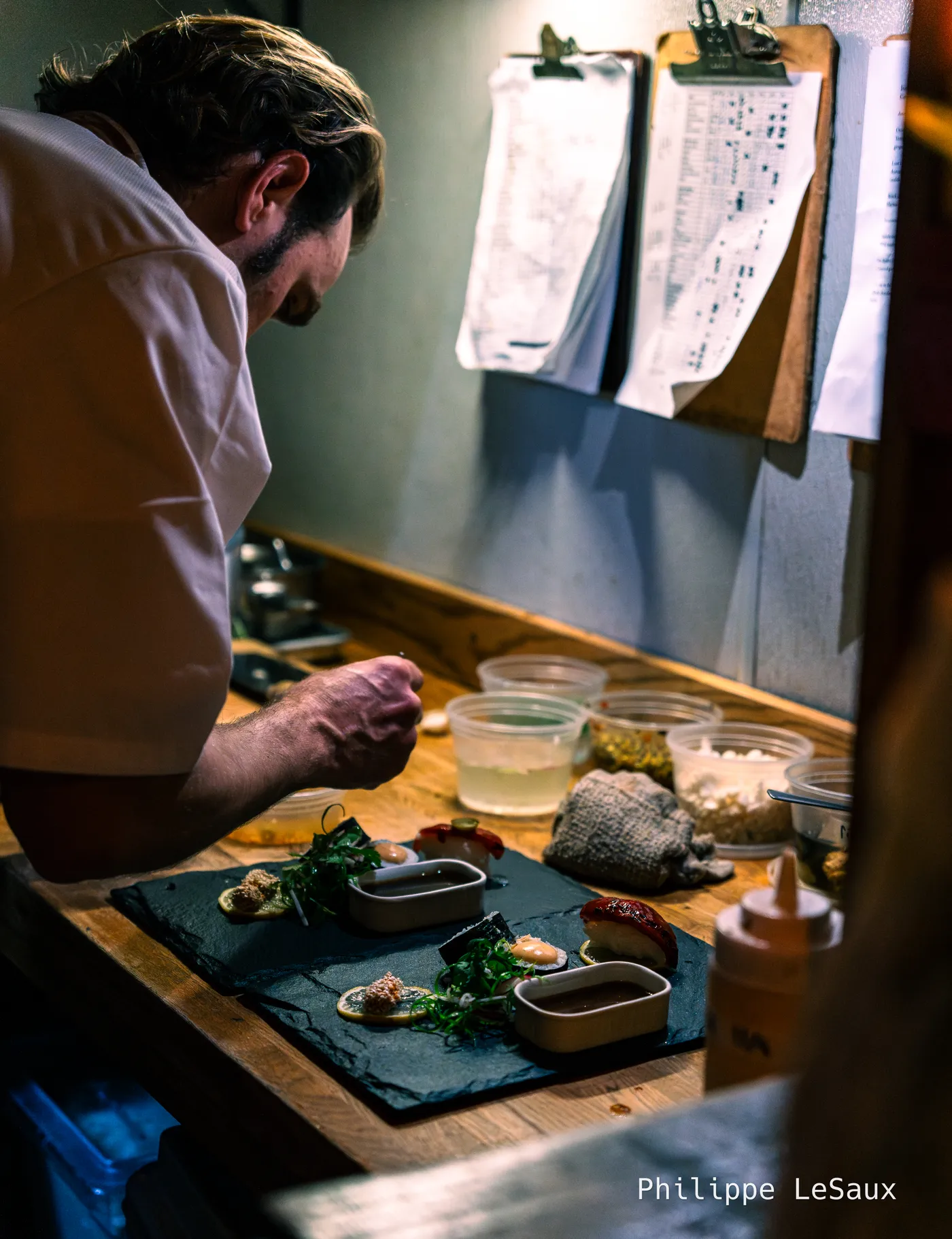 Chef Max Hosey puts the finishing touches on some vegan sushi