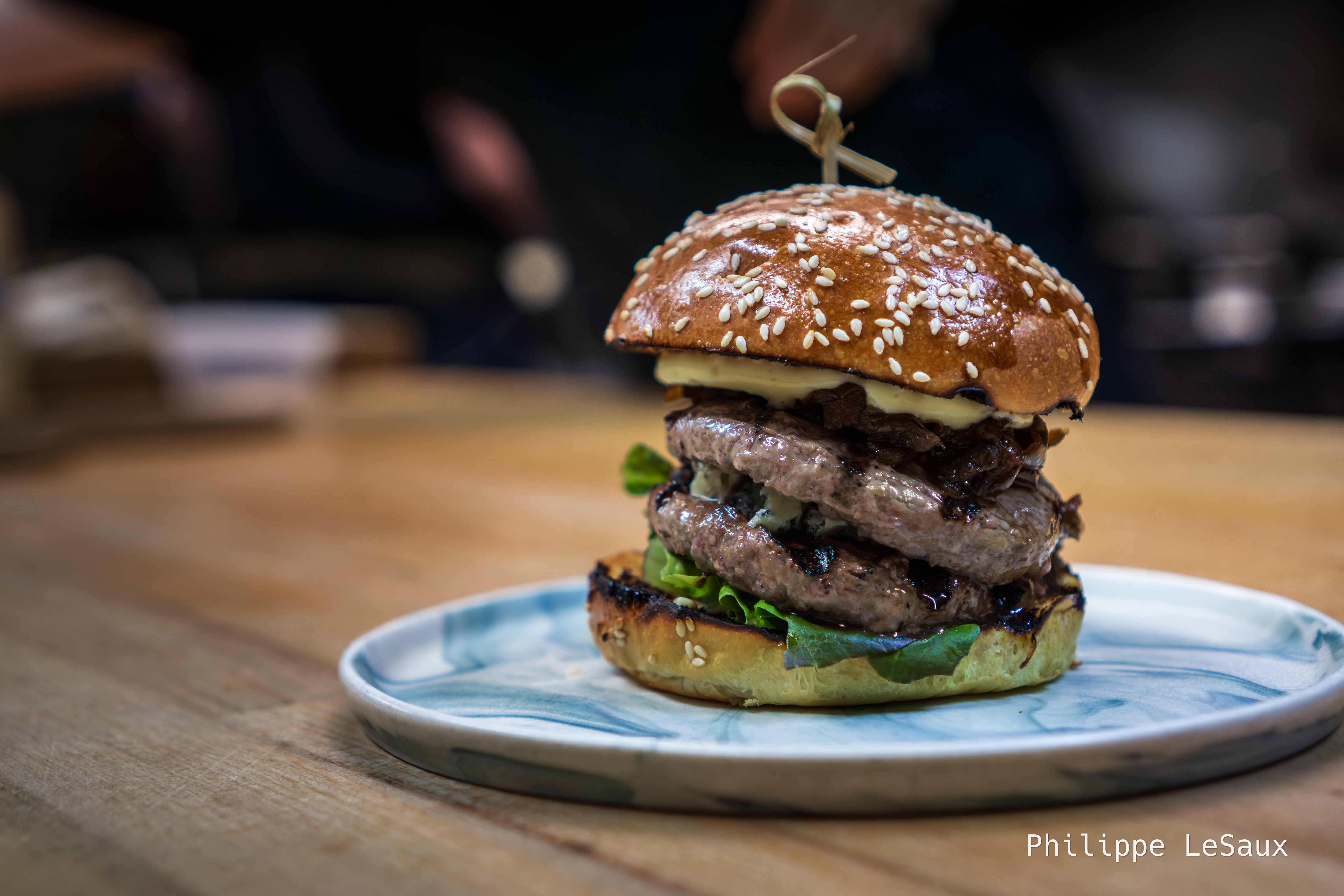 A hamburger in the kitchen, ready for serving